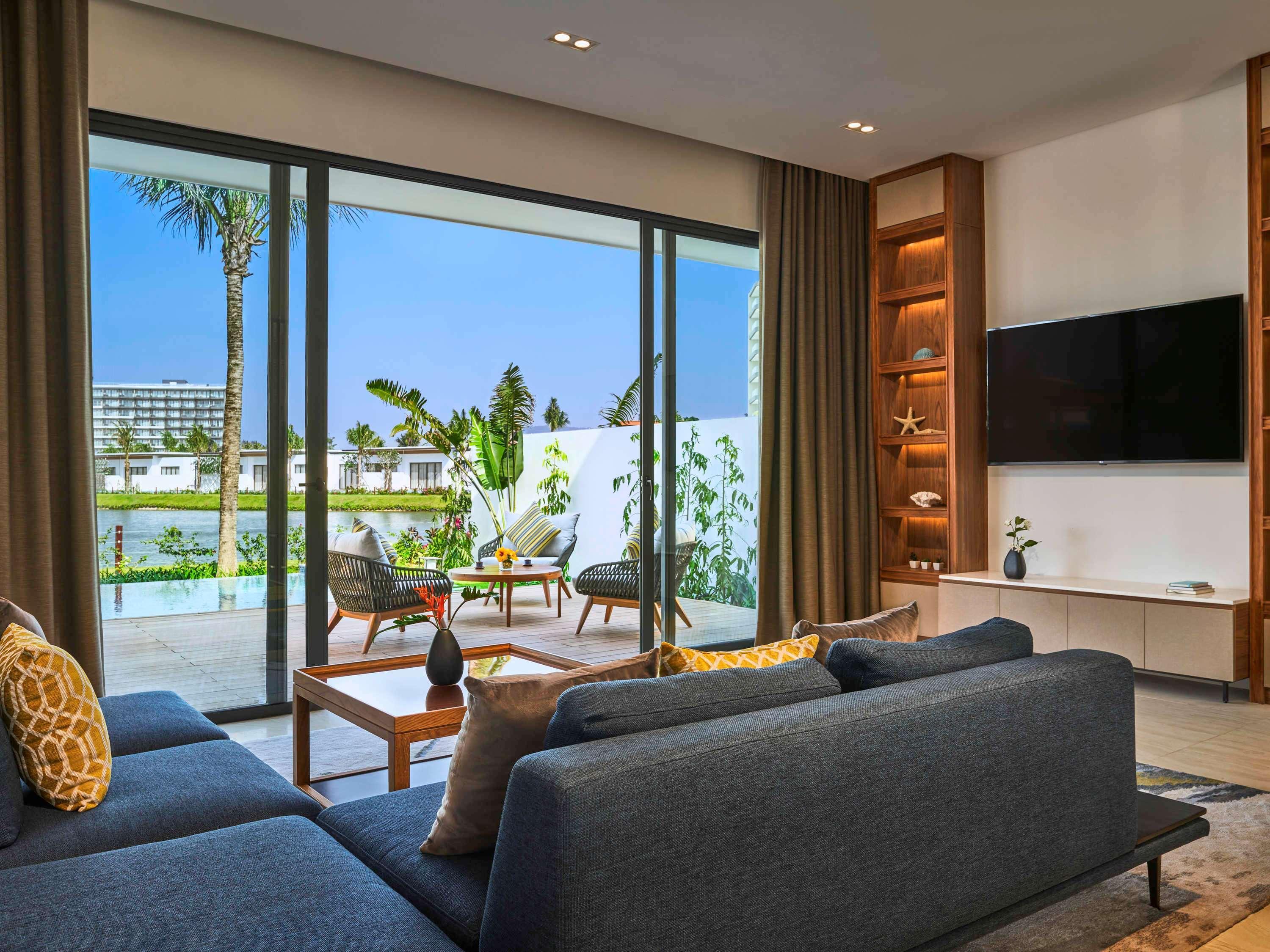 Mövenpick Villas&Residences Phú Quốc Exterior foto A living room at the hotel